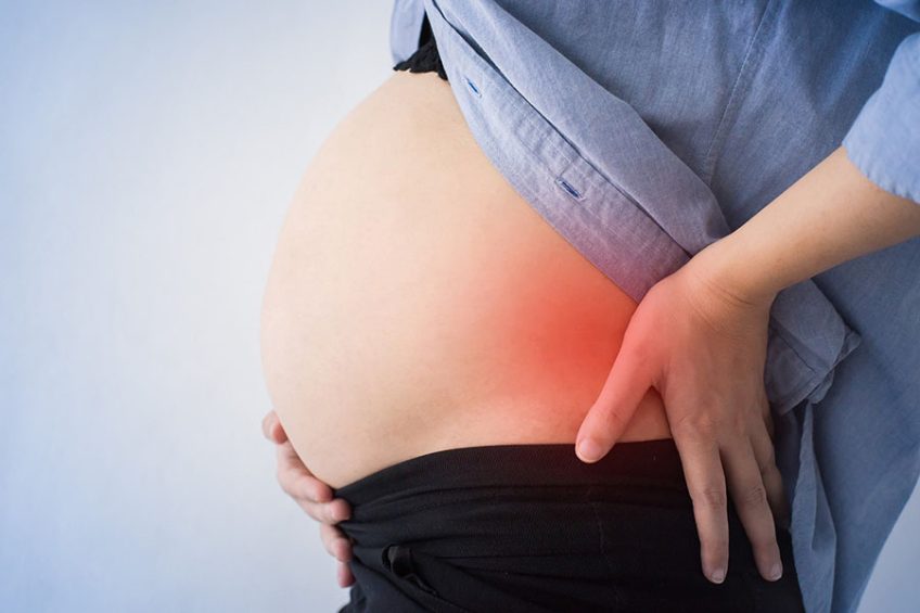 Back pain during pregnancy: causes, treatment