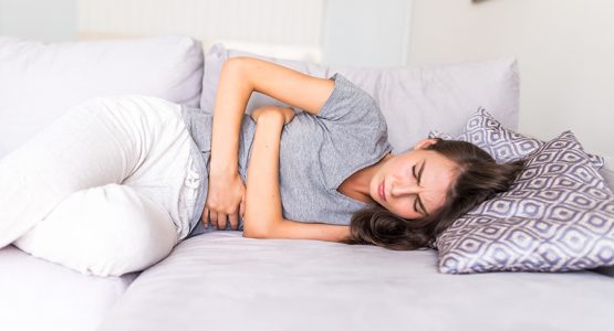 What is the link between back pain and constipation?